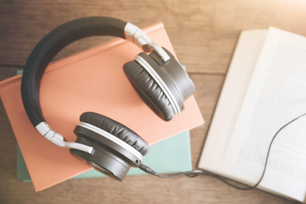 Headphones on books - The Hope Connection