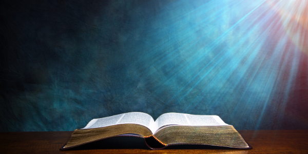 Open Bible with light shining on it - The Hope Connection